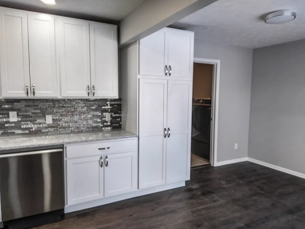 Luxury vinyl plank flooring running through a bright Salina kitchen