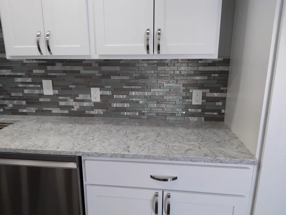 Glass mosaic tile backsplash installed in a Salina kitchen remodel